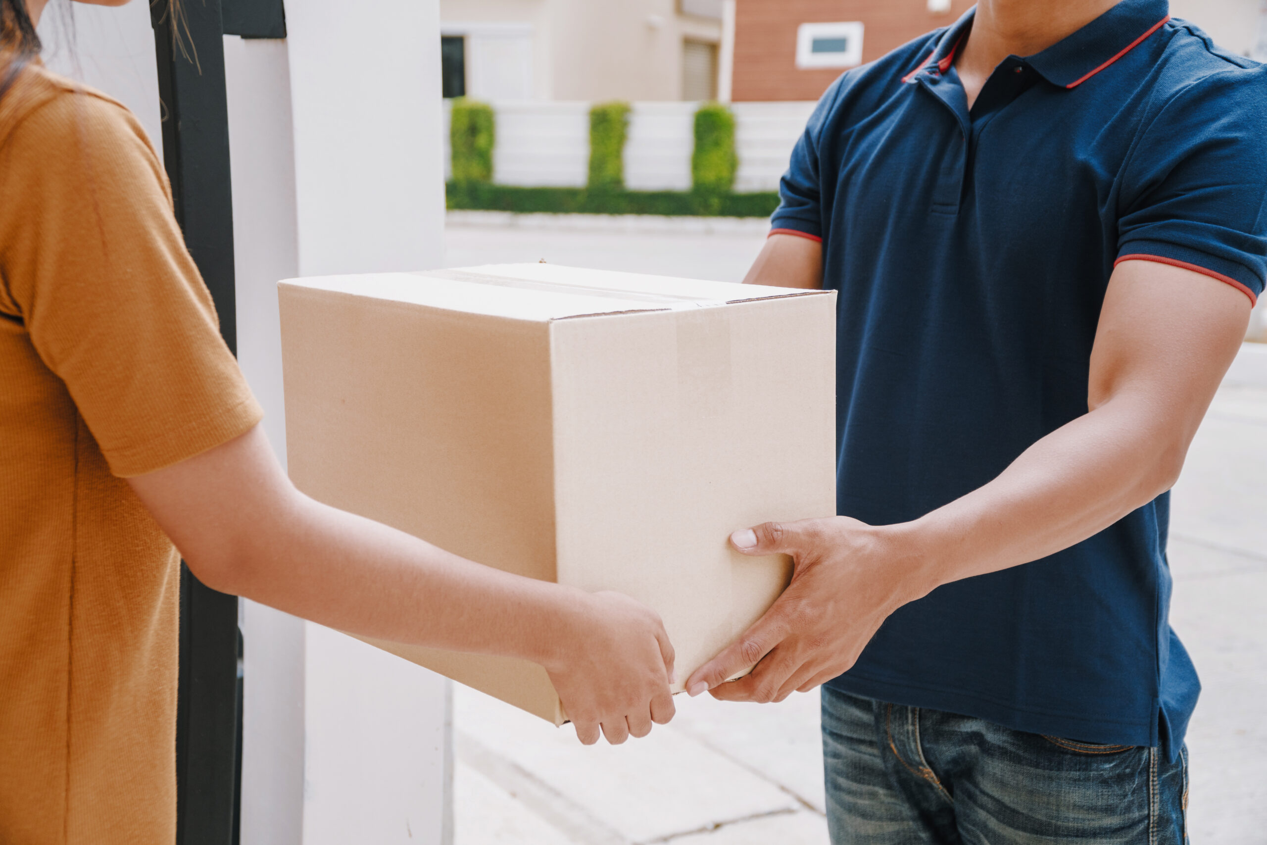 Fast service commerce delivery concept. Deliveryman sent parcel package box for customer, Received parcel box from shopping online
